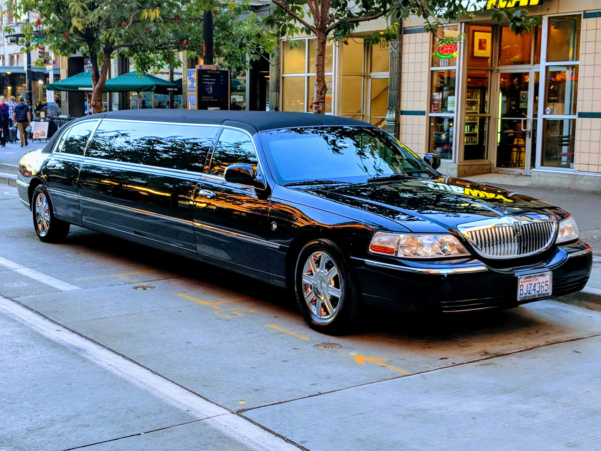 Stretch limo on Seattle city street — exterior