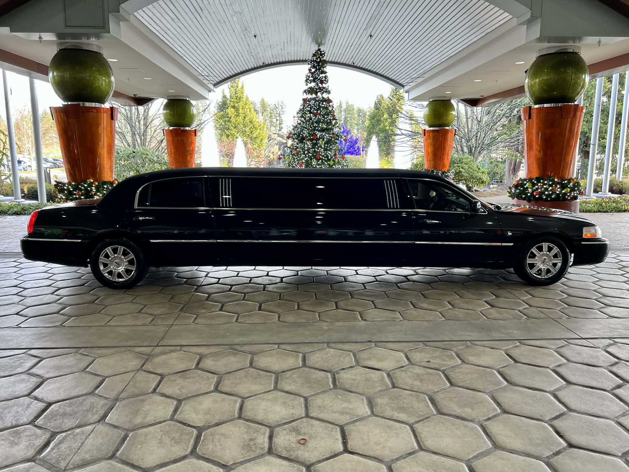Cascade Limousine stretch limo — elegant hotel arrival