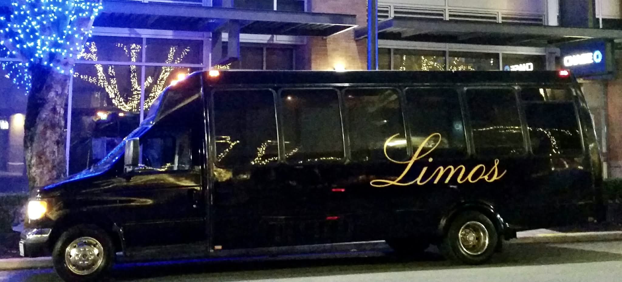 Cascade party bus exterior at night — Seattle nightlife transportation